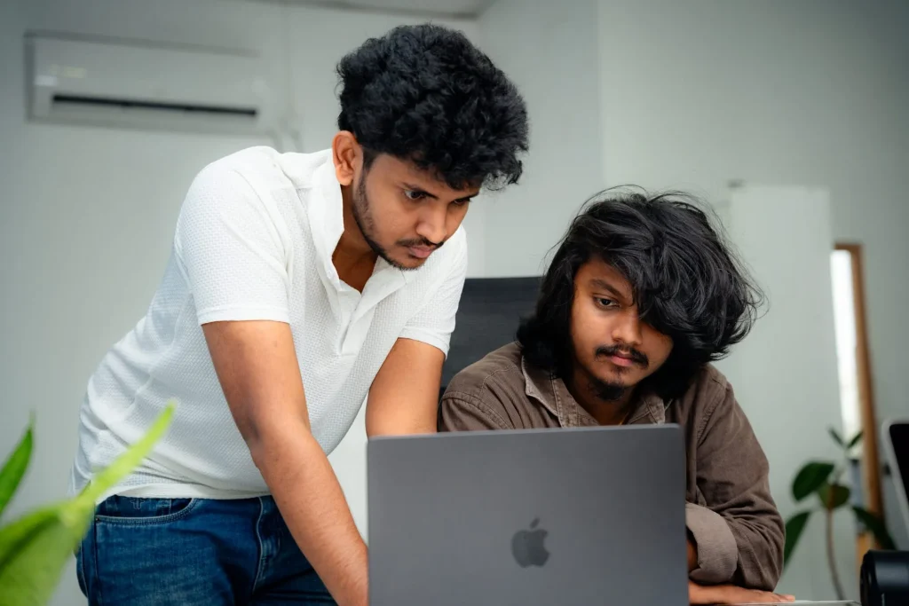 W3Inventor designers collaborating on a brand identity project in the Creative Studio at Pannipitiya - Colombo