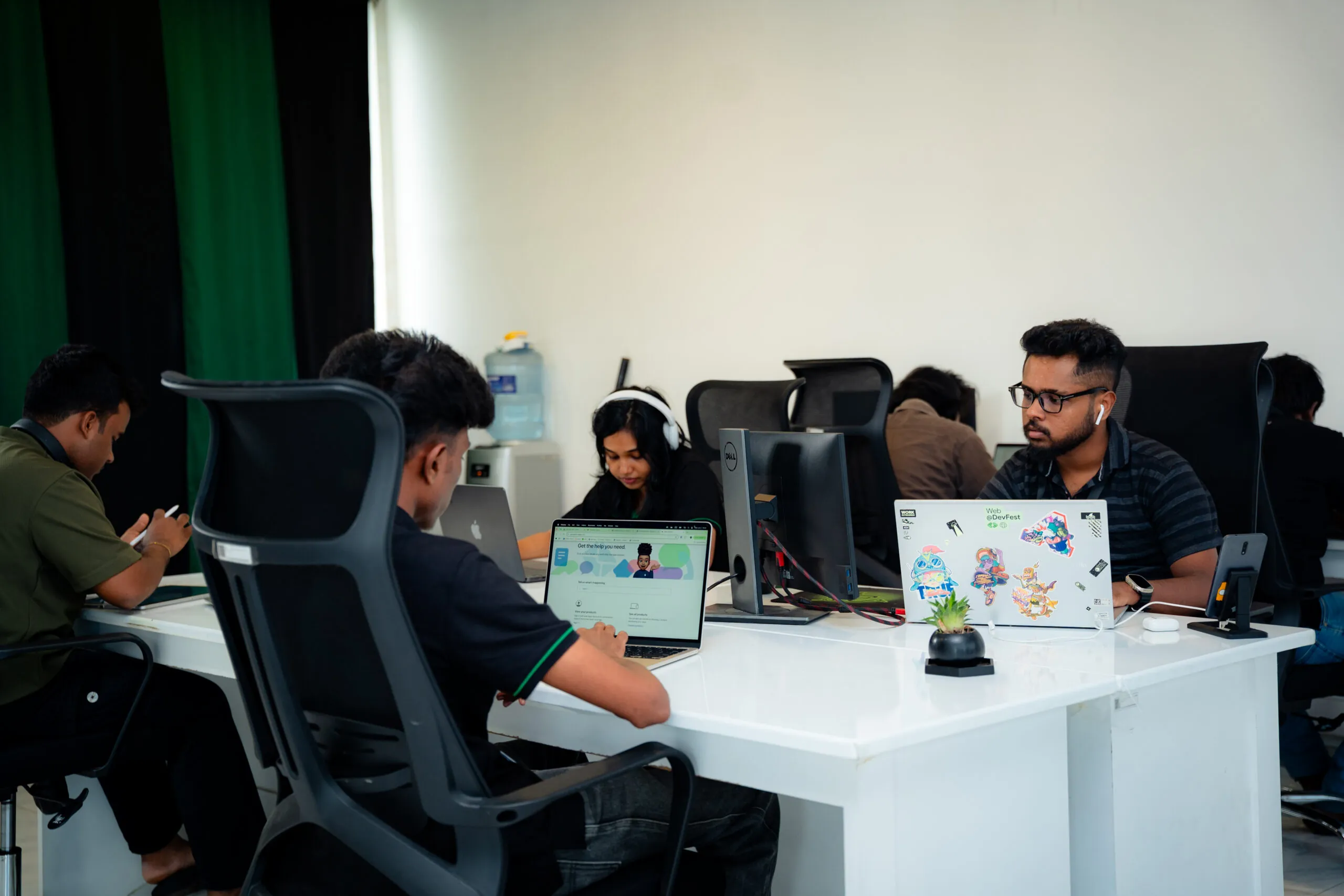W3Inventor team members working at their desks