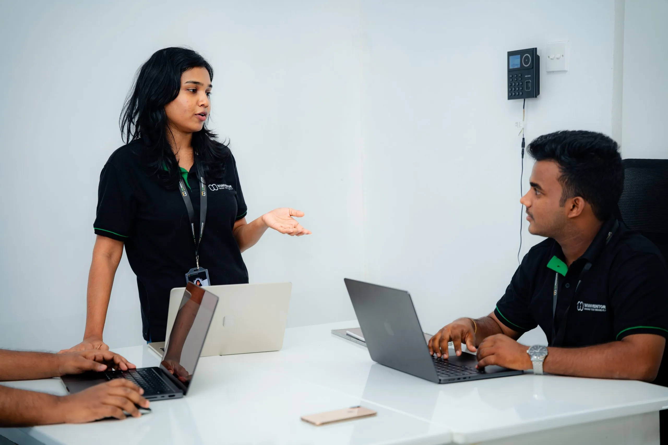 digital transformation consulting – W3Inventor team member speaking with a colleague