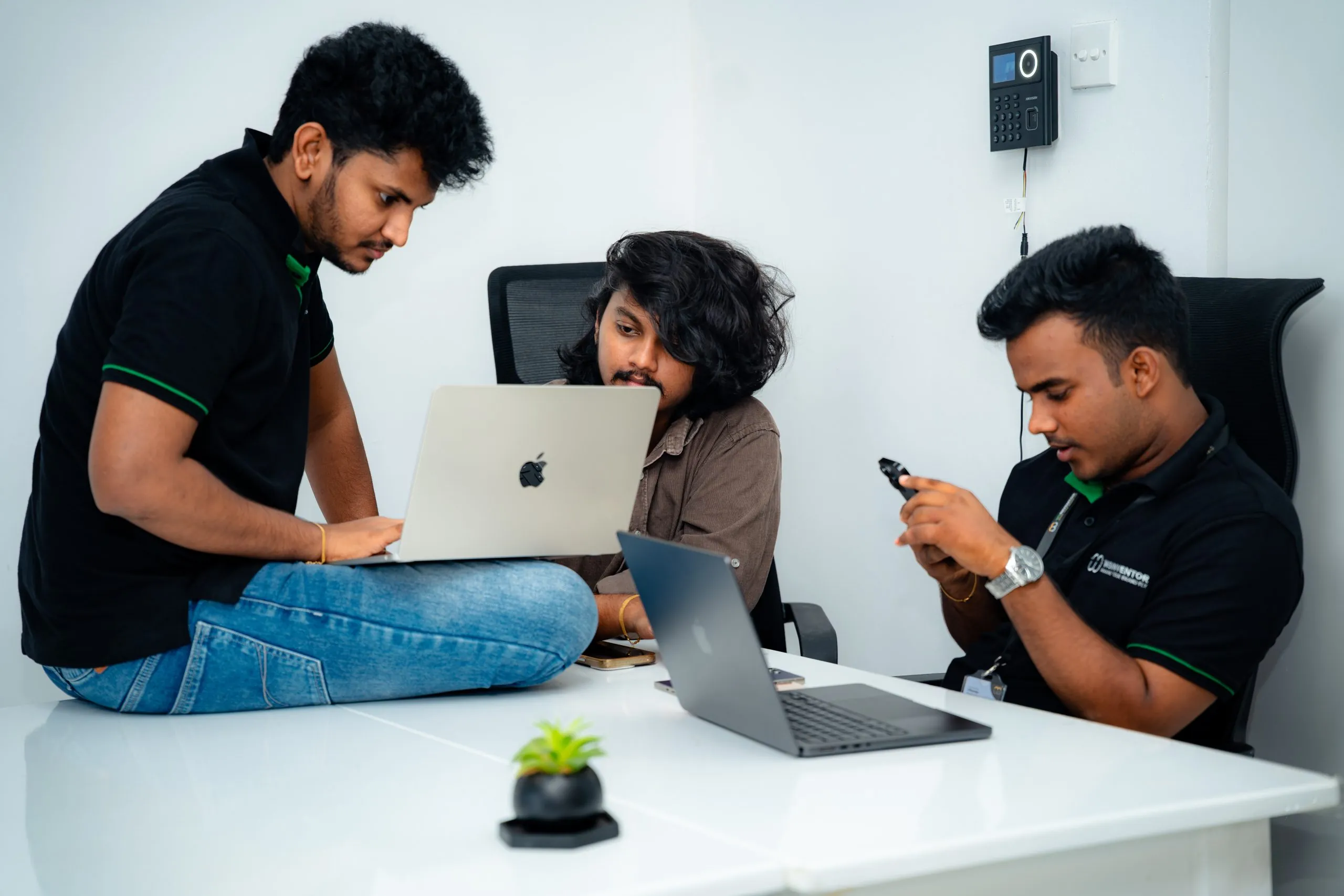 custom software solutions – W3Inventor team member working on a laptop
